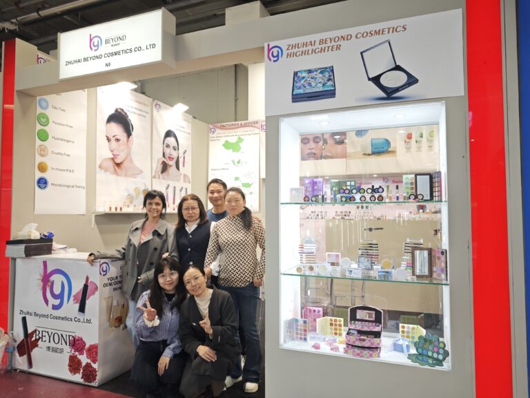 BEYOND COSMETICS booth at CosmoProf Bologna 2026, multichrome eyeshadow display, cosmetic OEM factory
